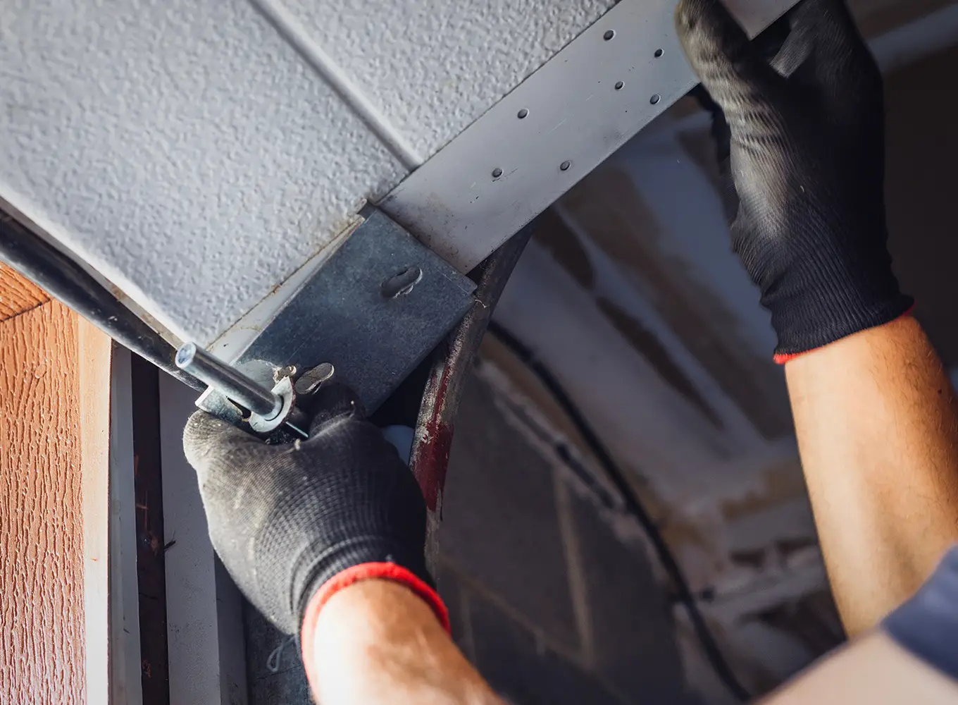 emergency garage door track adjustment services in the Metro East