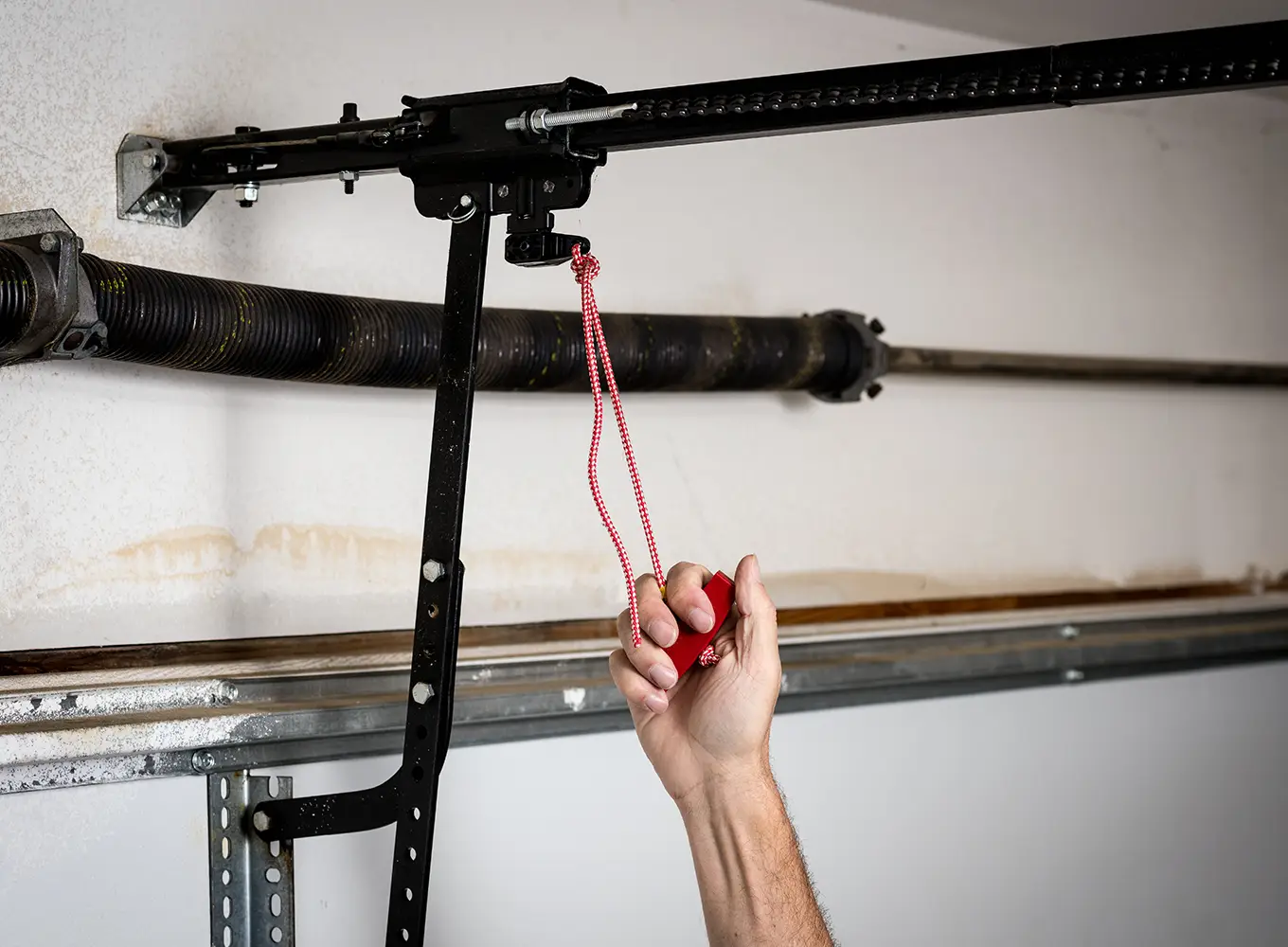 releasing the automatic garage door to perform emergency repair services in Edwardsville IL