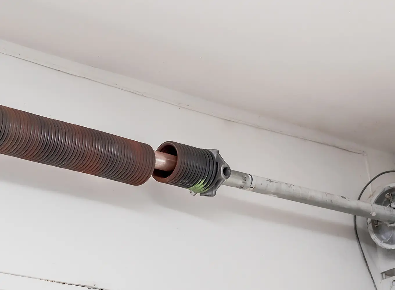 broken garage door spring needing emergency repair services near the Edwardsville IL area
