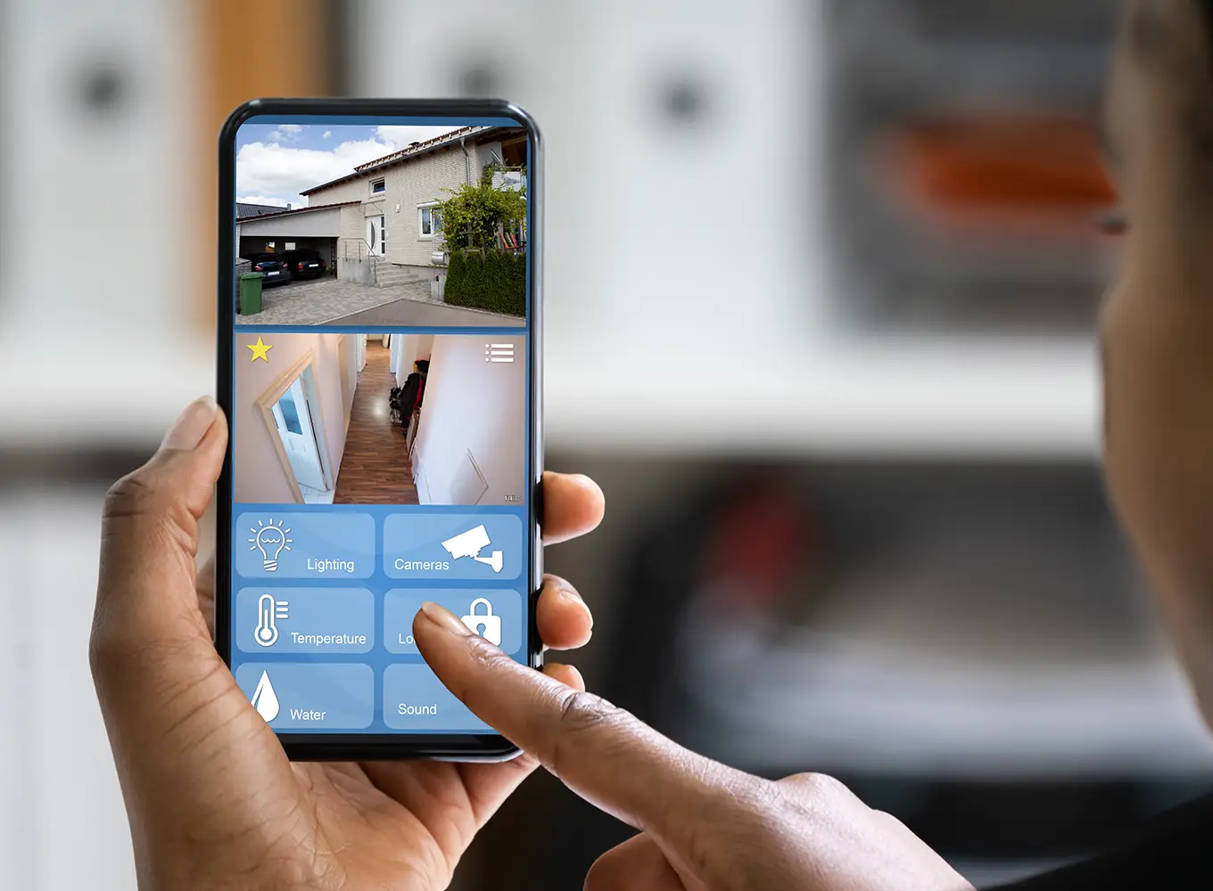 person looking up security system on phone